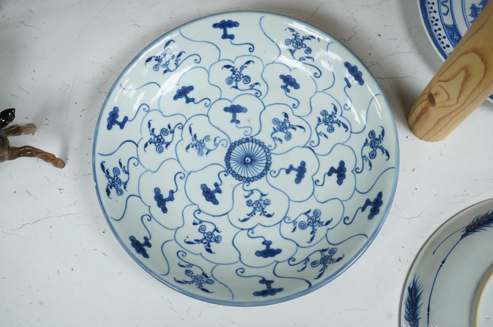 Three Chinese blue and white plates, largest 26cm